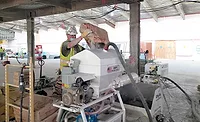 wc1220-ft-dust_control-p2-hyflex-walls-ceilings-dust-suppression.jpg HyFlex worker