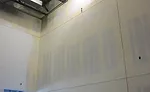 Perforated mud legs can be attached with 847 spray adhesive. Image courtesy of Trim-Tex.