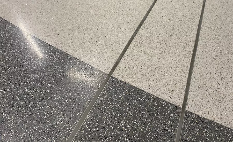 Floor expansion joint covers incorporate the same finished Terrazzo as the surrounding floor for a smooth surface transition that meets ADA guidelines for slip resistance. 