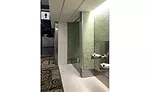 Finished construction near the Frontier Service Desk located in the North Terminal highlights how expansion joint covers provide a matching aesthetic using the PJC floor and FCC wall to soffit and ceiling. 