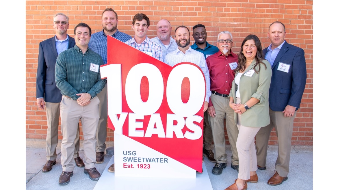 USG Sweetwater Employees With 100 Years Sign