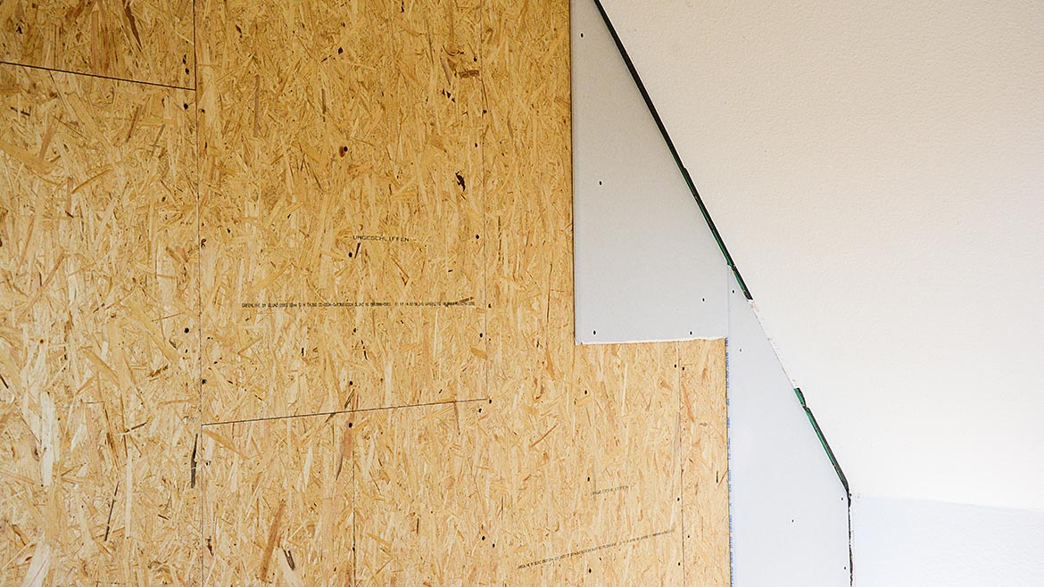 Gypsum panels on an interior wall