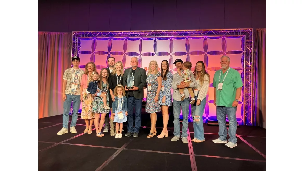 John Hinson with Family After Receiving Pinnacle Award