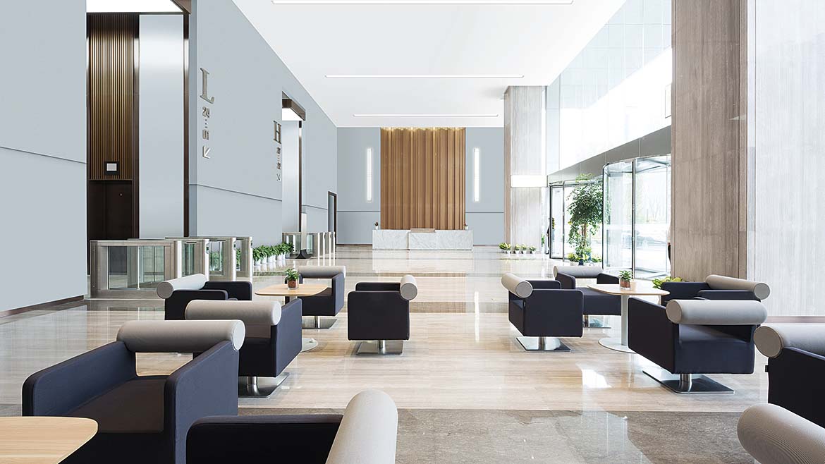 A large lobby space with a Seamless Acoustical Ceiling/Wall System