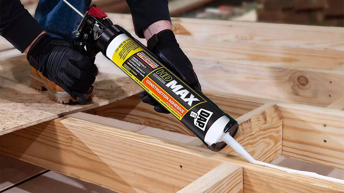 WC0624-FEAT-Innov-p6-DAP-HDMax_28oz_AppShot2_Subfloor_27512_6x6.jpg