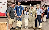 Shelly Travis, the executive director of SkillsUSA, center at the start of the 2025 Skills competition.