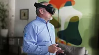 A man wearing a Virtual Reality headset