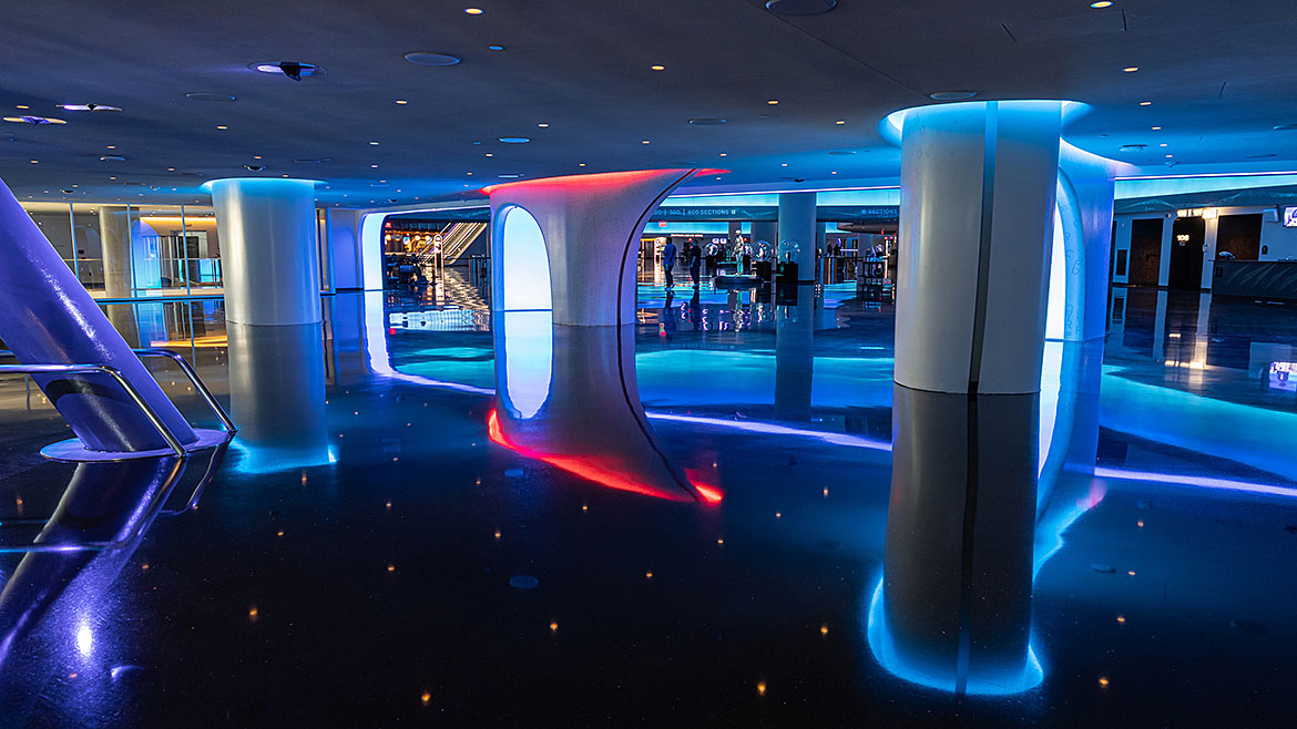 Visitors experience an interplay of futuristic design and immersive lighting throughout Sphere