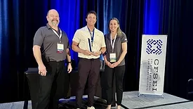 Daniel Linneman (center) of McClure accepts the 2025 CFSEI Design Excellence First Place award, Municipal category, from CFSEI’s Immediate Past Chair Dana Hennis and Chair Tammy Gleed.