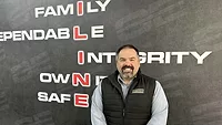 A portrait of Leo Marchesseault of Optiline