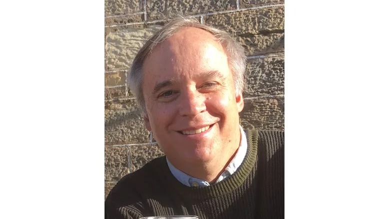 A portrait of Christopher Hoskins the Coatings Pioneer