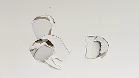 Picture of damaged drywall after installed