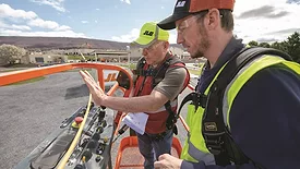A trainer and student on a boom lift at JLG's training university