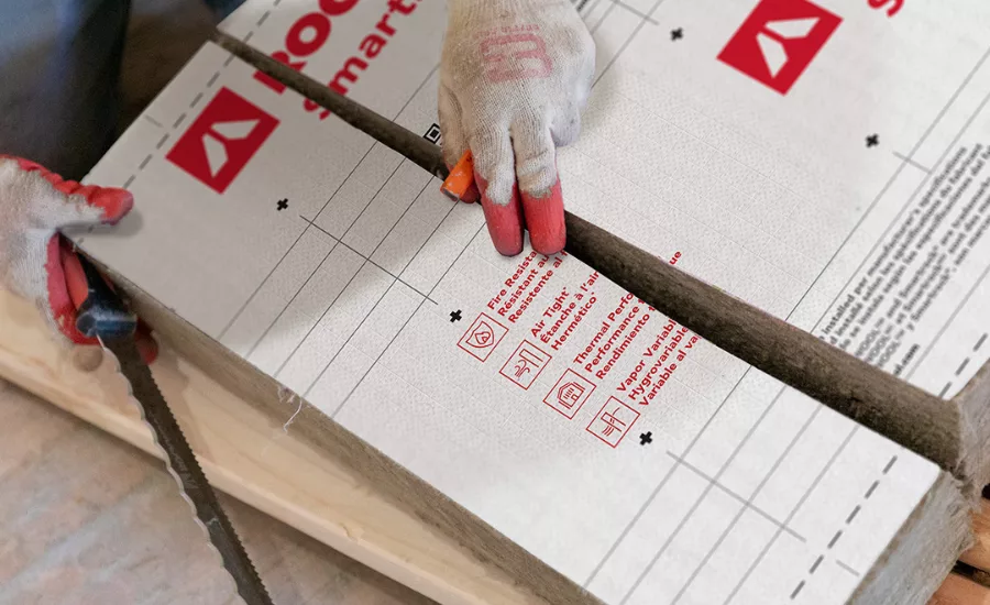 ROCKWOOL Smartrock in a pile with a glove on top