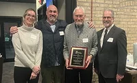 Sheet Metal Supply team accepts award