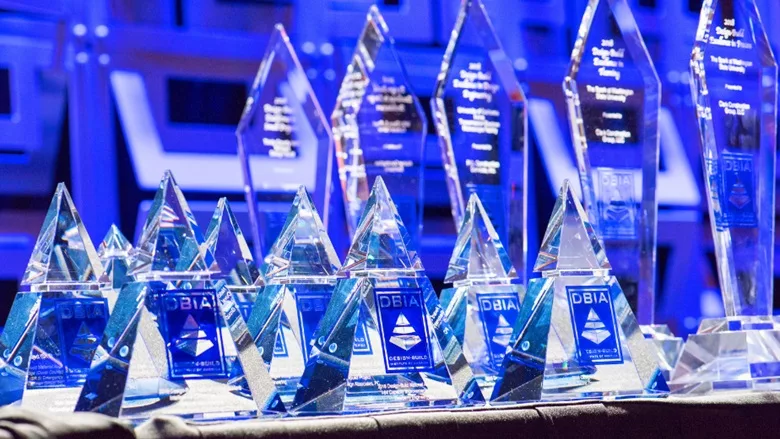 A picture of various trophies from past DBIA awards
