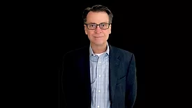 A portrait of Mike Griffin from 2026