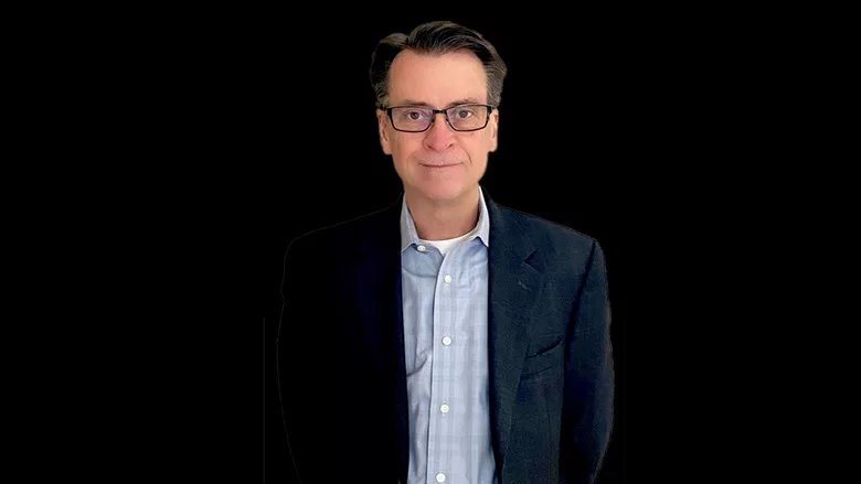 A portrait of Mike Griffin from 2026