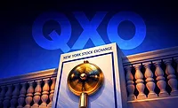 QXO logo and the New York Stock Exchange