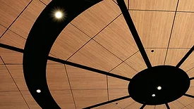 The circular ceiling inside the rotunda at the Minneapolis American Indian Center is the winner of the 2025 CISCA Construction Excellence Award.