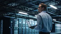 A man working in a data center
