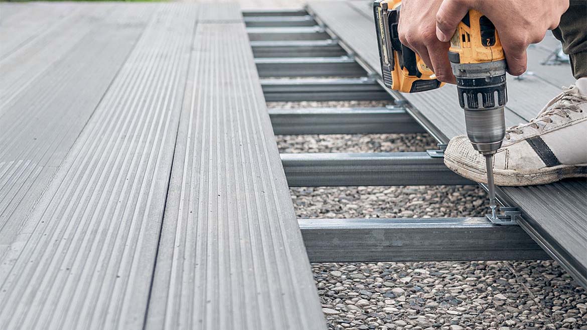 A remodeler used cold-formed steel (CFS) framing and helical piers to build a strong backyard deck.