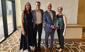 family photo with award 
