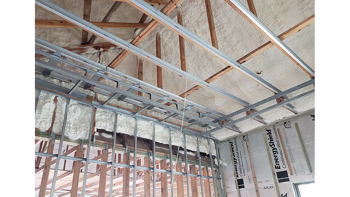Insulation placed around wood and steel framing
