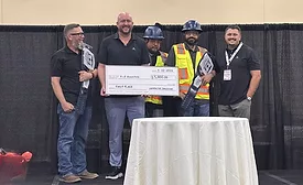 T-P Acoustics team accepts the award