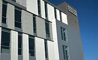 Multifin metal wall panel on exterior of building