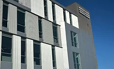 Multifin metal wall panel on exterior of building