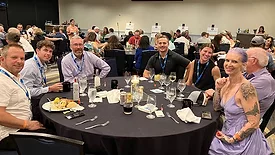 A table of contractors with Eddie McCormick, TLPCA ED, at the association's 2023 event