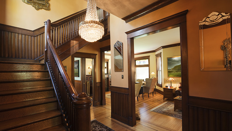 Entryway Foyer and Staircase of Restored Renovated Victorian Home Interior