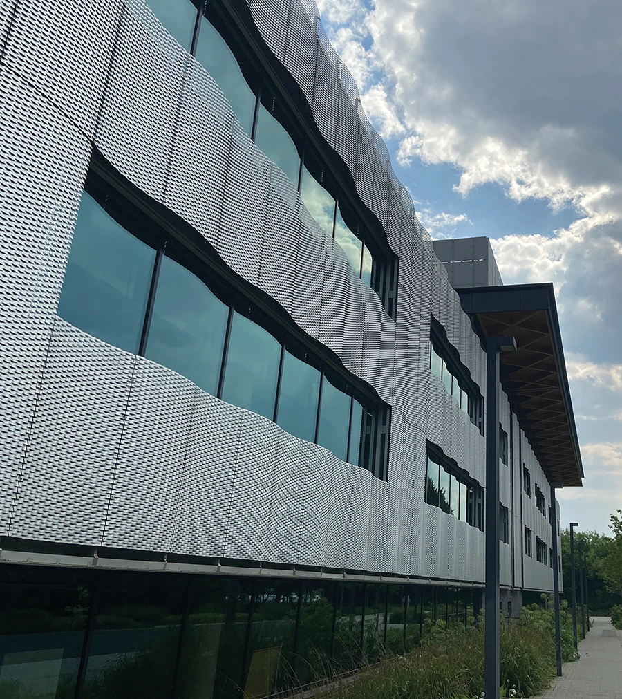 Expanded metal panels with a seamless installation