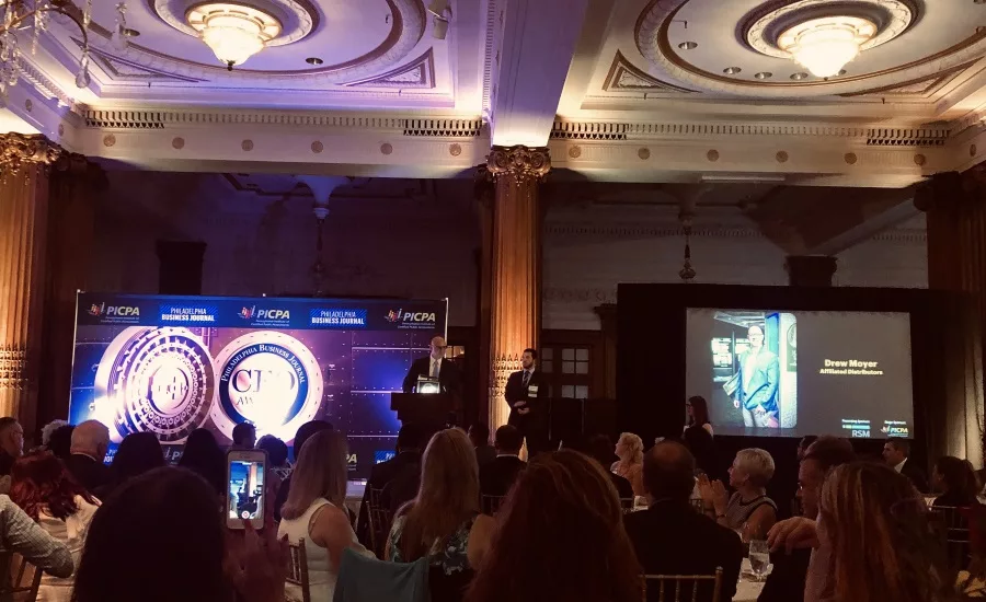 Image of Drew Moyer Accepting Award