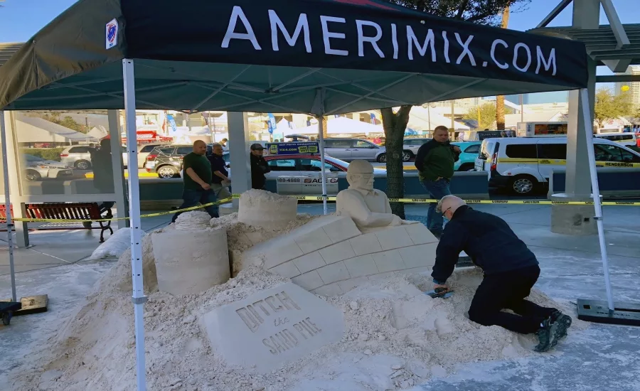WOC-Show-Attendees-watch-sand-sculpture.jpg