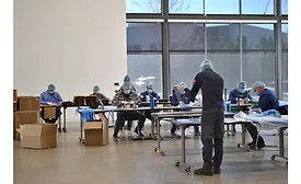 genie team members making masks