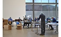 genie team members making masks