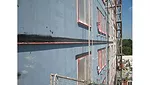 Liquid applied fenestration flashing incorporated into WRB.